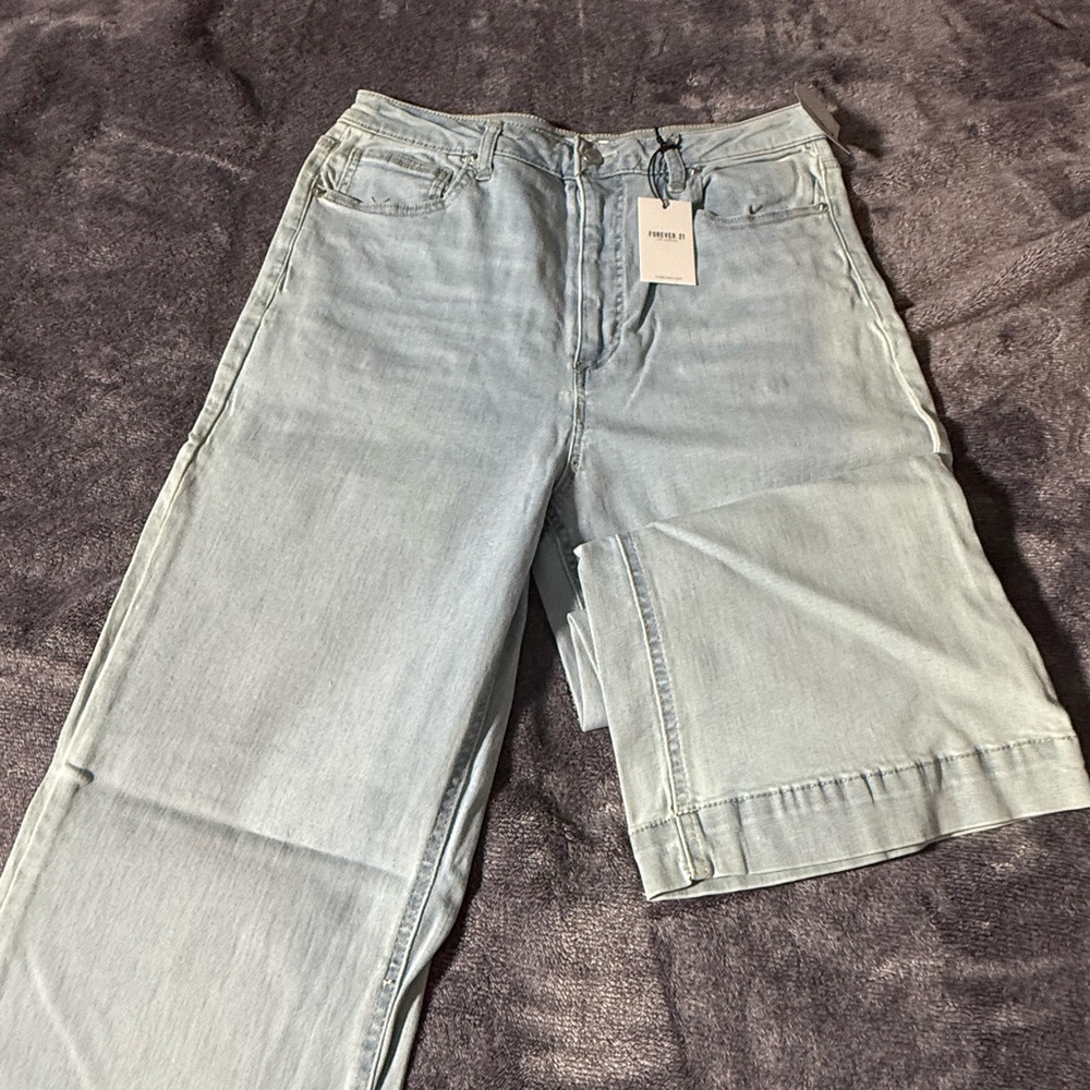 Size 31 more 7/9 light color wash flare jeans